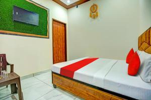 Ліжко або ліжка в номері OYO Hotel Patiala