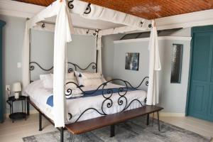 Postel nebo postele na pokoji v ubytování Mansion San Miguel