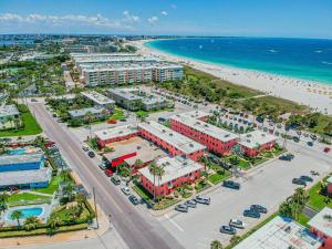 an aerial view of a resort and the beach at Gorgeous Beach view balcony with heated pool in St Pete Beach