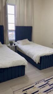 Postel nebo postele na pokoji v ubytování Flat in Maabela