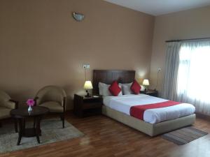Letto o letti in una camera di ROKPA Guest House