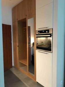 a small kitchen with a stove and a refrigerator at Great place to stay in Warsaw in Warsaw