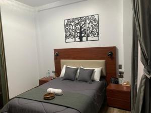 Postel nebo postele na pokoji v ubytování Hotel Sacha Golden