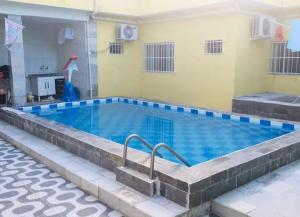 a large swimming pool in a building at Cantinho especial de Piedade in Recife