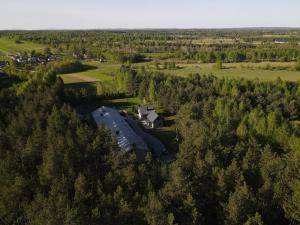 an aerial view of a large house in the forest at Dobry Dom I in Staszów