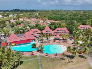 an aerial view of a resort with a swimming pool at Studio Bruni Lodge in Sainte-Anne