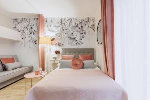 APARTEMENTY ''WERANDA'' z ogrodem w centrum客房内的一张或多张床位