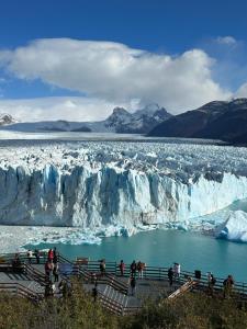 a view of a glacier and a body of water at Alma Andina in El Calafate