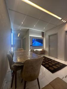 TV o dispositivi per l'intrattenimento presso Martil dream with private garage