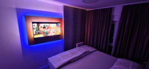 Postel nebo postele na pokoji v ubytování LORD-Osijek