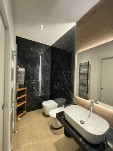 Koupelna v ubytování Bieffegi Luxury Suite