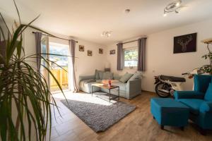 A seating area at Haus Faninger - Summercard included