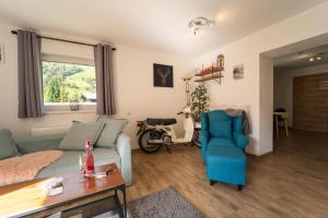 A seating area at Haus Faninger - Summercard included