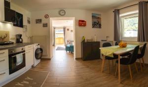 A kitchen or kitchenette at Haus Faninger - Summercard included