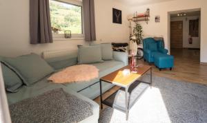 A seating area at Haus Faninger - Summercard included