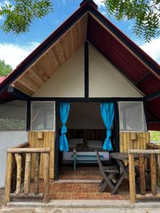 Ein Patio oder anderer Außenbereich in der Unterkunft Mangoo Glamping