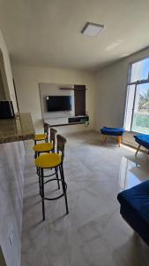 TV a/nebo společenská místnost v ubytování Recanto na beira da praia