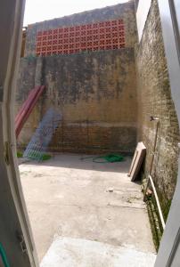 a view from the inside of a building at Kitnet a 150m da praia com Ar Condicionado in Rio Grande