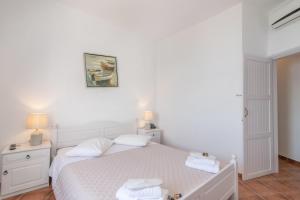 Postel nebo postele na pokoji v ubytování Agali bay hotel