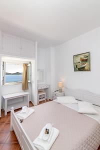 Postel nebo postele na pokoji v ubytování Agali bay hotel