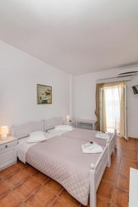 Postel nebo postele na pokoji v ubytování Agali bay hotel