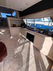 a view of a kitchen on a yacht at Yate Hotel STV in Barcelona