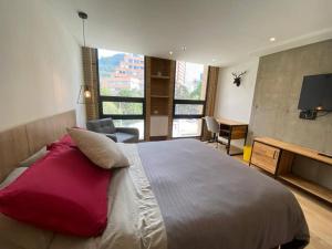 Cama o camas de una habitación en Events and traveling apartment on Bogotá