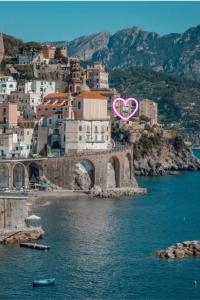 a city with a heart sign in the middle at Casa Gargano Ravello Amalfi Coast in Amalfi