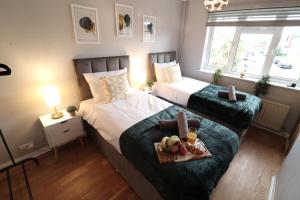 Krevet ili kreveti u jedinici u objektu Perfect 2 Bedroom Flat Heathrow, Free Parking