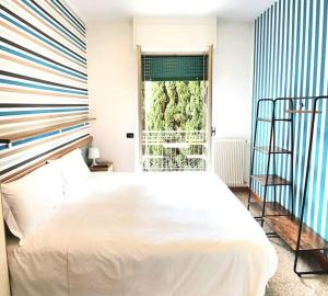 A bed or beds in a room at Residence Corallo