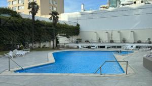 A piscina localizada em Hotel Peninsula ou nos arredores