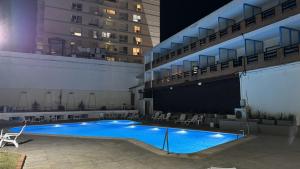 A piscina localizada em Hotel Peninsula ou nos arredores