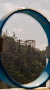 a view of a building from a magnifying glass at Artistic home with fantastic view of la Alhambra in Granada