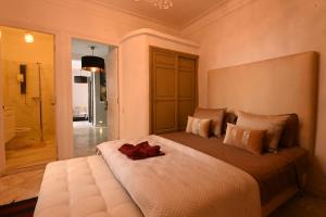 Postel nebo postele na pokoji v ubytování Riad VIP Bed & Breakfast