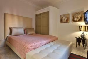 Postel nebo postele na pokoji v ubytování Riad VIP Bed & Breakfast