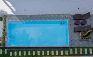 an overhead view of a swimming pool at Villa Windfall Unawatuna in Unawatuna