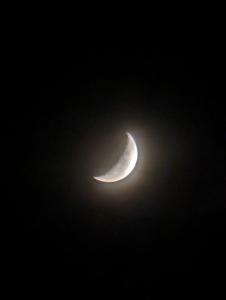 a waxing crescent moon in the night sky at Para un poquito relax in Barra de Valizas