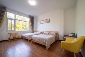 Foto Enshis asuva majutusasutuse 恩施硒坪民宿 Enshi Xiping Homestay galeriist