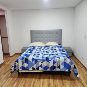 Postelja oz. postelje v sobi nastanitve amplio apartamento en Sabaneta