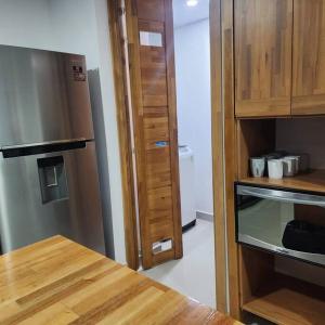 Kuhinja oz. manjša kuhinja v nastanitvi amplio apartamento en Sabaneta