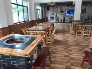Foto Enshis asuva majutusasutuse 恩施硒坪民宿 Enshi Xiping Homestay galeriist
