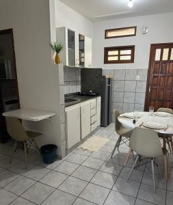 Kuchyň nebo kuchyňský kout v ubytování Apartamento com varanda