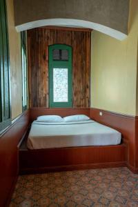 Postel nebo postele na pokoji v ubytování Sala Done Khone Hotel