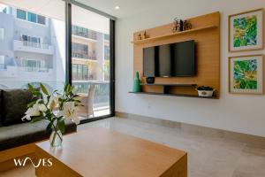 Μια τηλεόραση ή/και κέντρο ψυχαγωγίας στο Oceana Residences by Waves l Lujo Contemporáneo a Pasos del Mar