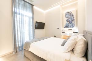 Postel nebo postele na pokoji v ubytování BillMar Luxury Apartment in the center of Gythio