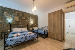 A bed or beds in a room at Katerina View