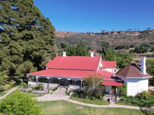 an aerial view of a house with a red roof at The Victoria House in Ficksburg