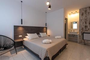 A bed or beds in a room at Katerina View