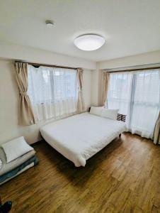 Krevet ili kreveti u jedinici u okviru objekta Fieldnever Apartment STAY - Maisonette Family room