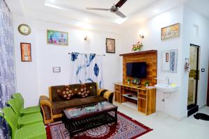 Predel za sedenje v nastanitvi Bhagora CJMA Home Stay/Villa